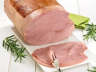 Ambachtelijke beenham in paal : slicing